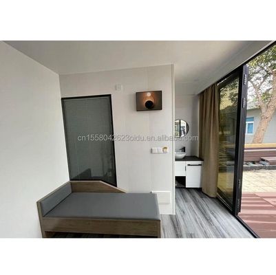 Color personalizado Contenedor moderno Mini habitación cápsula de vacaciones Un dormitorio Hotel de estructura de acero Diseñado con estilo moderno