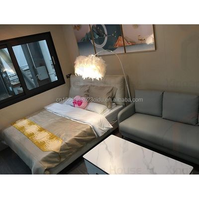Color personalizado Contenedor moderno Mini habitación cápsula de vacaciones Un dormitorio Hotel de estructura de acero Diseñado con estilo moderno