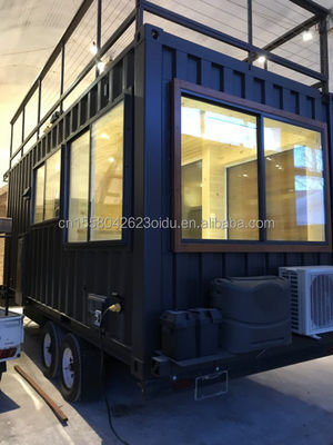 Diseño moderno de acero de color personalizado fabricado con instalación rápida Casas modulares prefabricadas en ruedas para remolque móvil de campamento