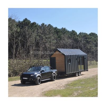 Diseño moderno Casa pequeña en ruedas Material de acero Camping al aire libre Kit de construcción de jardín con panel de sándwich de onda de 50/75/100 mm