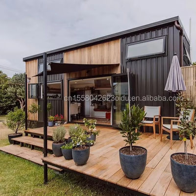 Contenedor de paquete plano de diseño moderno 20 FT Casa de acero prefabricada para exteriores o camping bajo costo