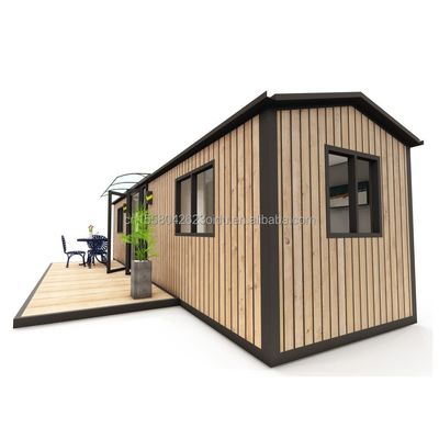 Casas de madera de colores personalizados para la familia hechas de paneles de sandwich de acero y tubos cuadrados de acero galvanizado