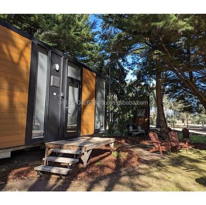 Casa de jardín de contenedor expandible con dormitorio Aplicación al aire libre Panel de sándwich de acero Material y color personalizado