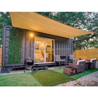 Estructura de tubo cuadrado de acero galvanizado 20 pies Casa de madera prefabricada para hotel y jardín independiente