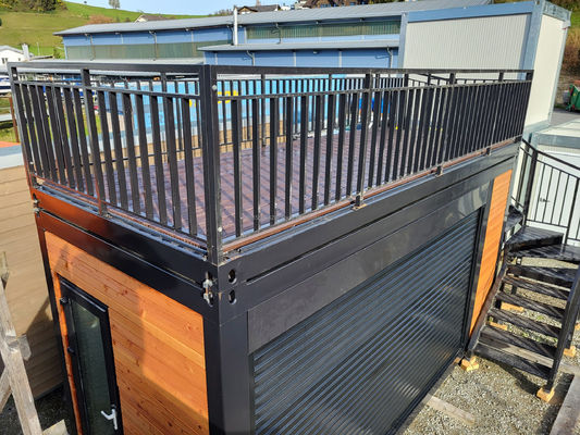 Contenedor de paquete plano de 20 pies de diseño moderno de acero prefabricado para el hogar móvil Bar de café con terraza y aplicación al aire libre