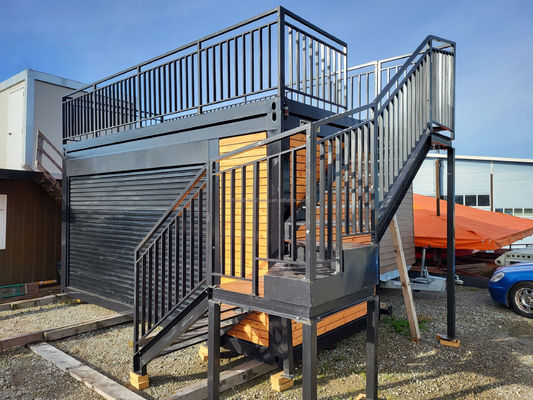 Contenedor de paquete plano de 20 pies de diseño moderno de acero prefabricado para el hogar móvil Bar de café con terraza y aplicación al aire libre