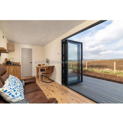 Casa de contenedores de envío de lujo moderna prefabricada Villa de 40 pies Un dormitorio Una cocina Un baño Un salón para la tienda
