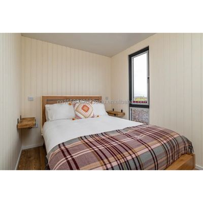 Casa de contenedores de envío de lujo moderna prefabricada Villa de 40 pies Un dormitorio Una cocina Un baño Un salón para la tienda