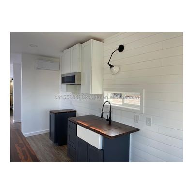 Casa de contenedores de envío de lujo moderna prefabricada Villa de 40 pies Un dormitorio Una cocina Un baño Un salón para la tienda