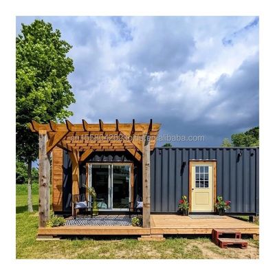 Hotel de lujo portable Contenedor de techo plano prefabricado Estudio Casa con 50/75/100mm Wave Panel Sandwich Pared y asequible
