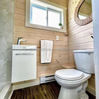 Hotel de lujo portable Contenedor de techo plano prefabricado Estudio Casa con 50/75/100mm Wave Panel Sandwich Pared y asequible