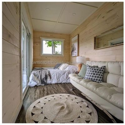 Hotel de lujo portable Contenedor de techo plano prefabricado Estudio Casa con 50/75/100mm Wave Panel Sandwich Pared y asequible