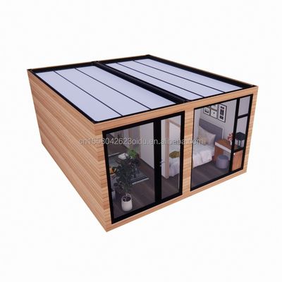 Prefabricado Casa de luz solar de vidrio de madera Casa de contenedores con color y pared personalizados Panel de sándwich de onda 50/75/100 mm