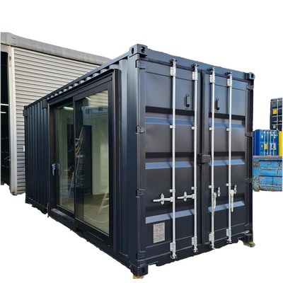 Hotel de un dormitorio Negro Casa de contenedores de envío Puerta de acero lujosa 20 pies Casas de madera prefabricadas con cocina y baño