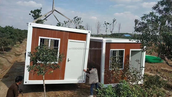 Color personalizado 20 pies Prefabricado Paquete plano Contenedor a granel Casa de marco para trabajadores migrantes en el sitio de construcción