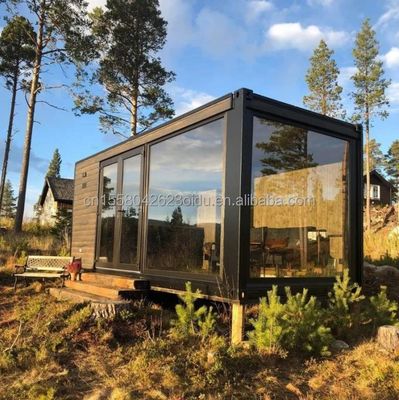 OEM 20 pies multifuncional de lujo de paquete plano casa de contenedores hogar con 50/75/100mm onda panel de sándwich pared
